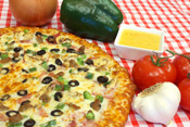 photo of a hand-tossed round pizza